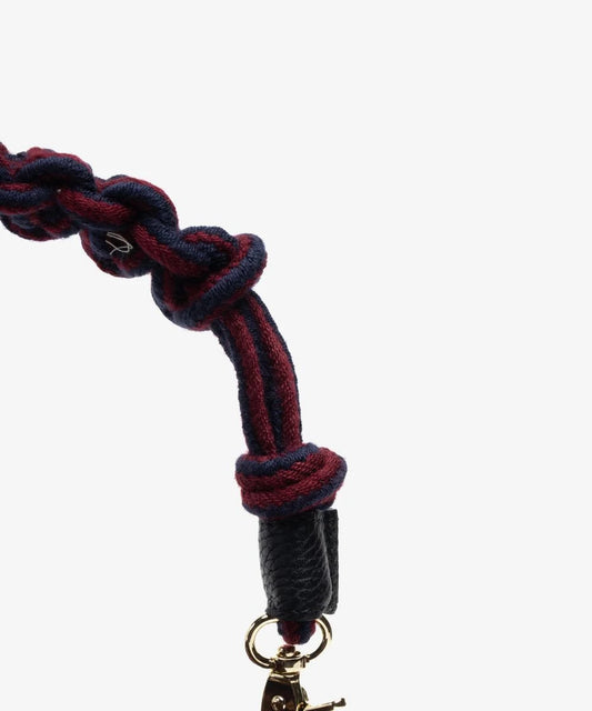 Bolso Pyxis cruzado mostaza y granate con asa de macramé