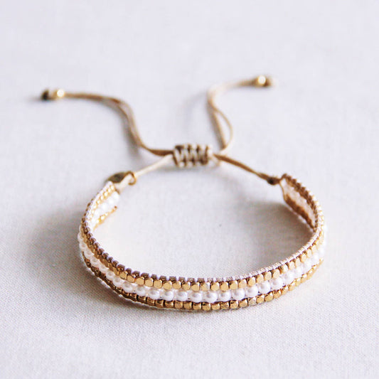 PULSERA TEJIDA, CUBOS Y PIEDRAS - PERLAS